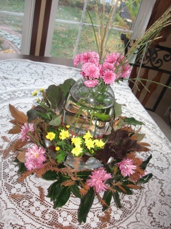 The centerpiece below was arranged in late November